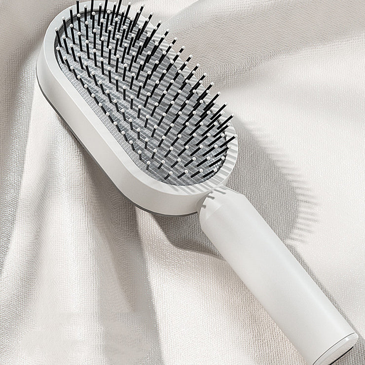 Brosse Auto-Nettoyante Femme Massage Cuir Chevelu & Anti-Statique