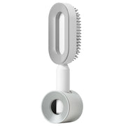 Brosse Auto-Nettoyante Femme Massage Cuir Chevelu & Anti-Statique