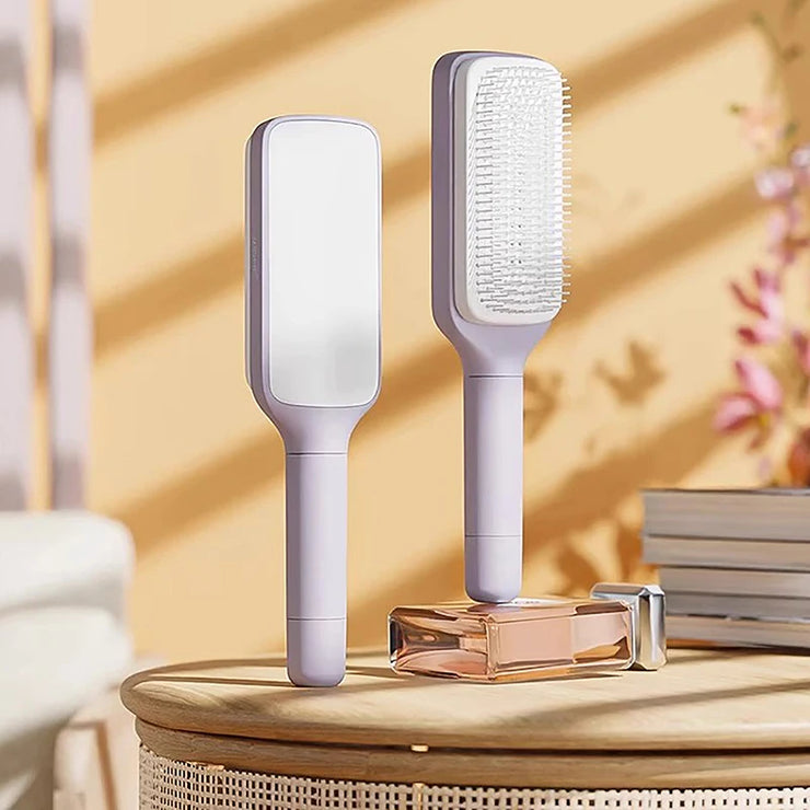 Brosse Pureté™Brosse à Cheveux Auto-Nettoyante
